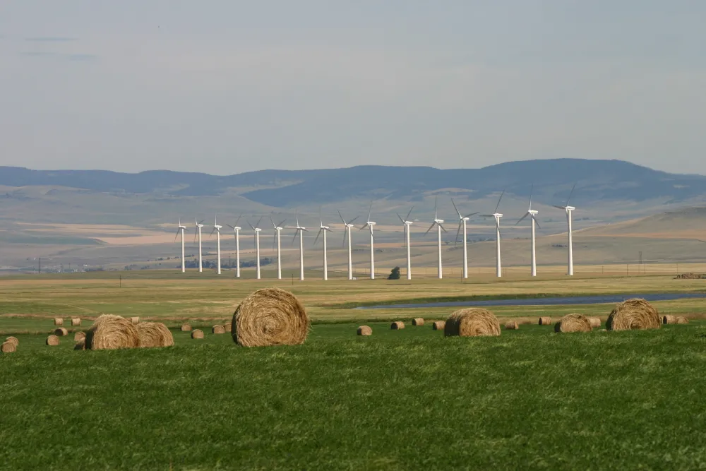 Wind turbines near mountains