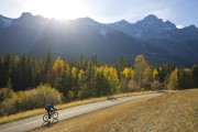 Cyclist riding the Trans Canada Trail bike path near Canmore, Alberta