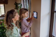 Demand-side management: family with smart thermostat