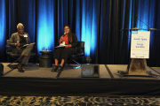 Heather Campbell and Calyssa Burke on stage at the Women in Alberta's Energy Transition event