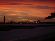 Oil production facility at dawn