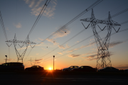 Sunset over electricity lines and towers