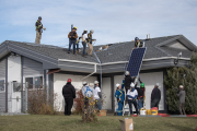 Group installing solar panels in central Alberta